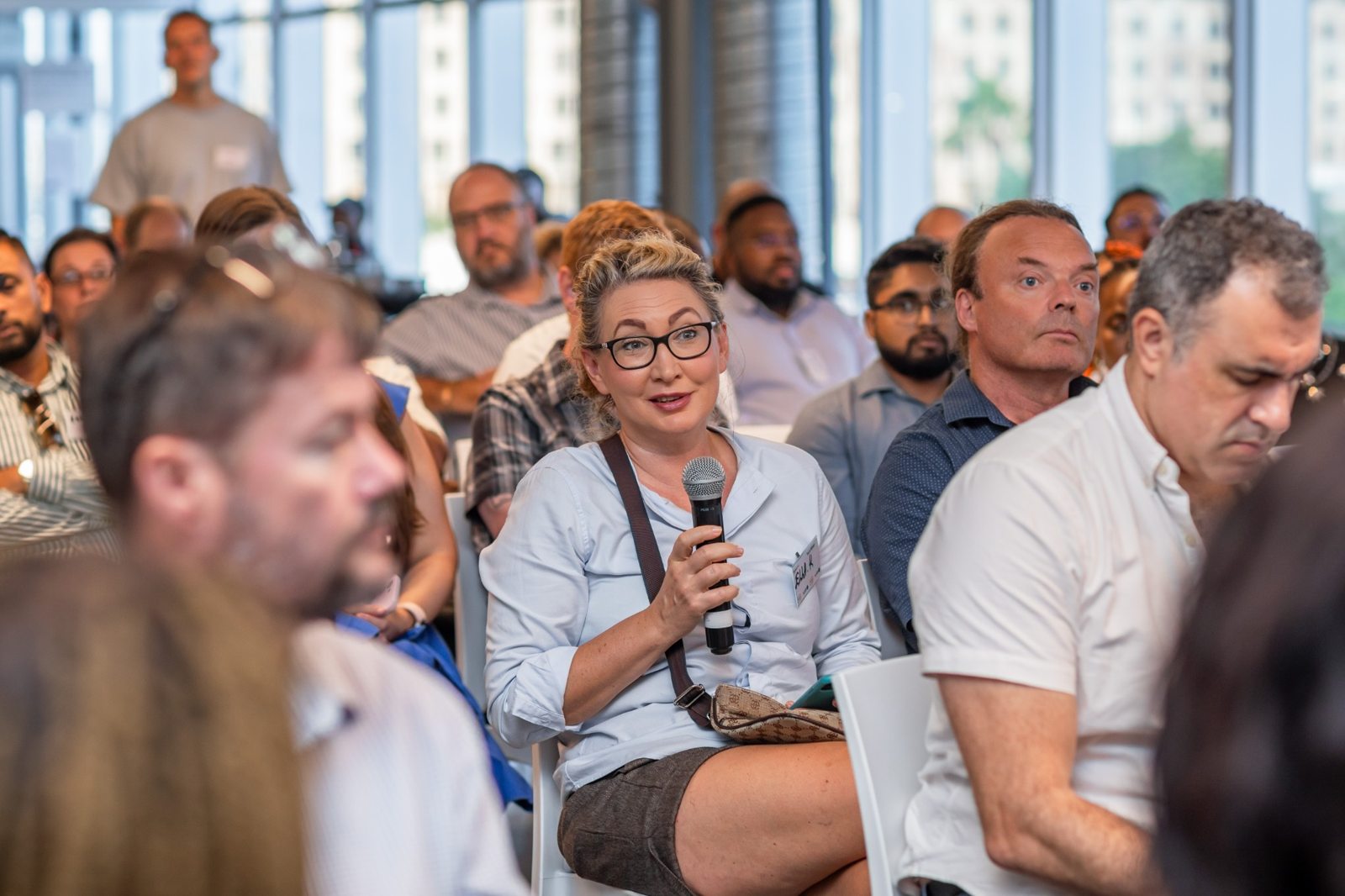 Entrepreneurs taking part in a community discussion